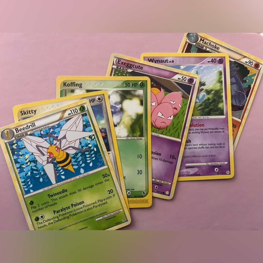 Pokémon cards from 2000s-2010s.